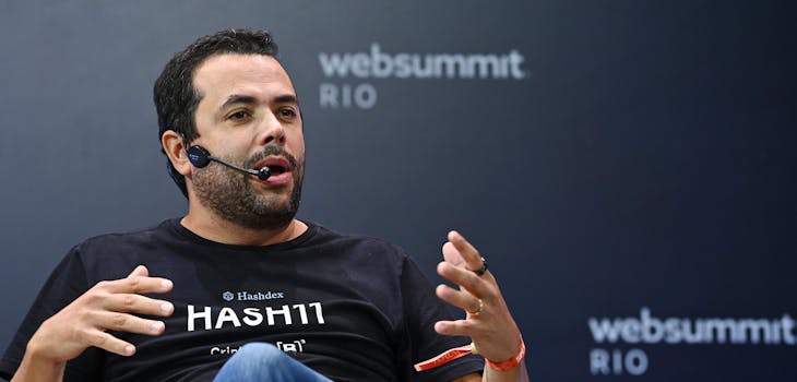 Marcelo Sampaio, Co-founder & CEO, Hashdex, sitting down and speaking on Crypto Stage during day two of Web Summit Rio 2023